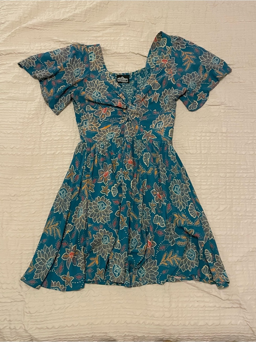 Angie Teal Floral Mini Dress with keyhole and flowy sleeves